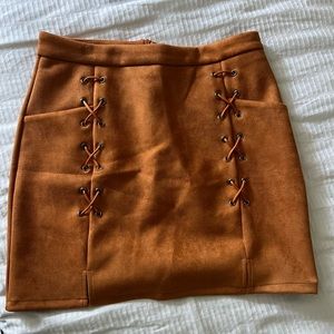 Copper mini skirt with detail